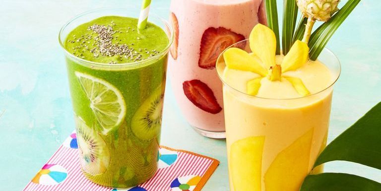 weight loss smoothies kiwi strawberry and pineapple smoothies on a blue surface
